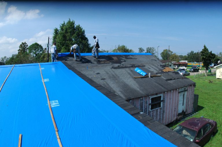 Tarping a Damaged Roof Blue Tarp Services Gotcha Covered Contracting