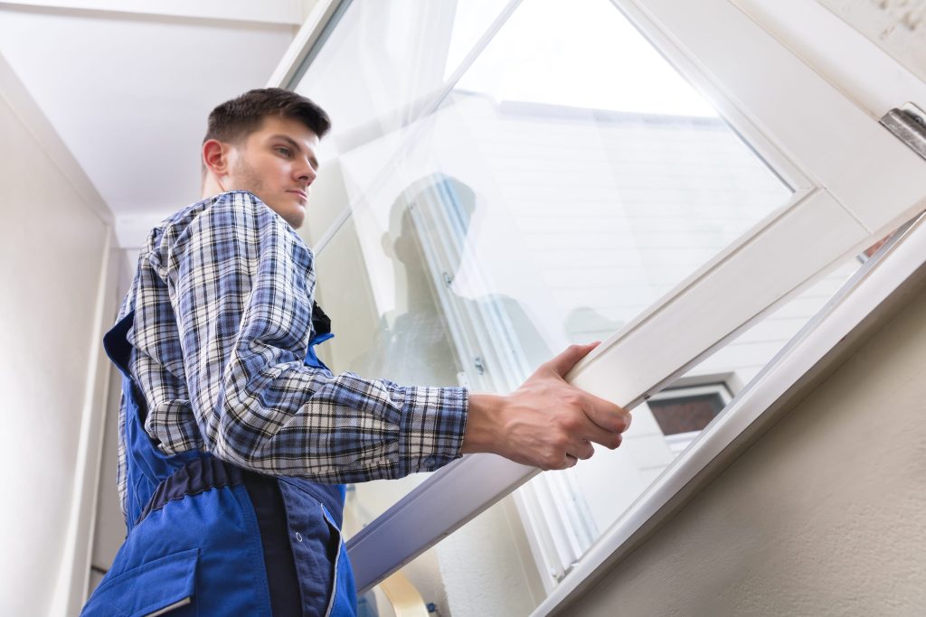 Man Replacing Windows